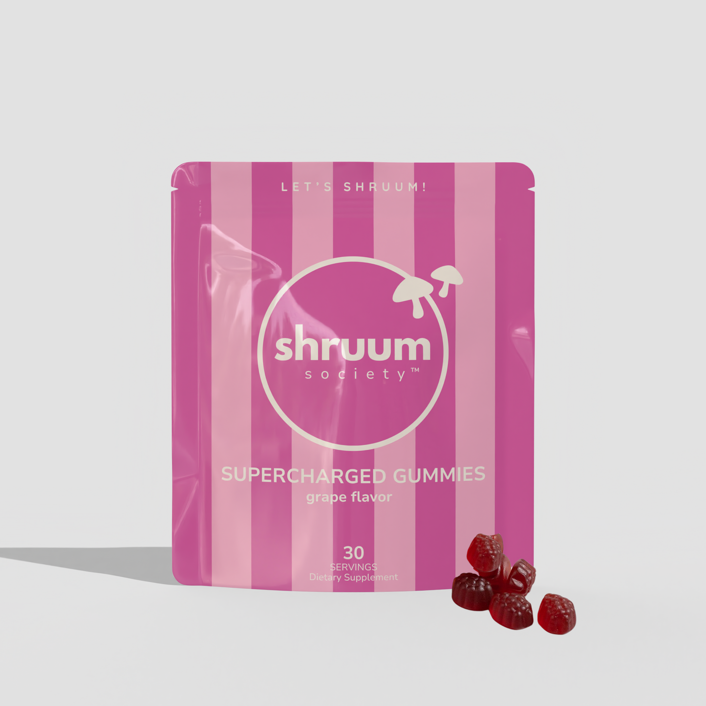 Pink striped package of shruum society supercharged gummies on a white background