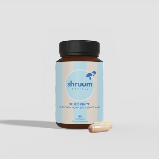 Shruum Neuro Ignite supplement bottle with a capsule on a light gray background